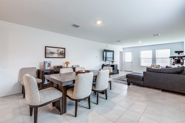 14069 Drover St, Pilot Point, TX 76258 - dining space featuring light tile patterned flooring and recessed lighting