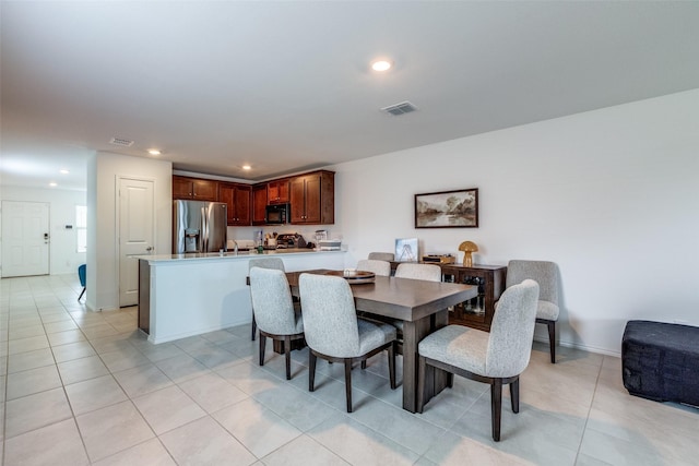 14069 Drover St, Pilot Point, TX 76258 - dining room featuring light tile patterned floors, recessed lighting, and baseboards