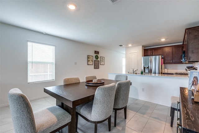 14069 Drover St, Pilot Point, TX 76258 - dining room featuring light tile patterned flooring and recessed lighting