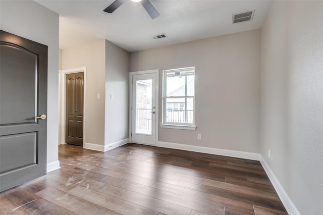 2007 Hill Country Ct, Arlington, TX 76012 - spare room featuring wood finished floors, ceiling fan, and baseboards