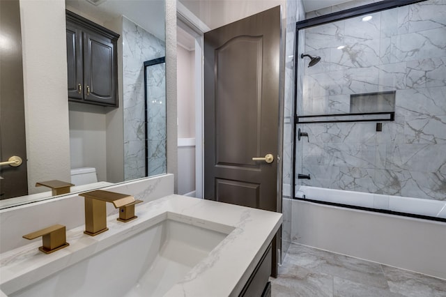 2007 Hill Country Ct, Arlington, TX 76012 - full bath with bath / shower combo with glass door, toilet, vanity, and marble finish floors