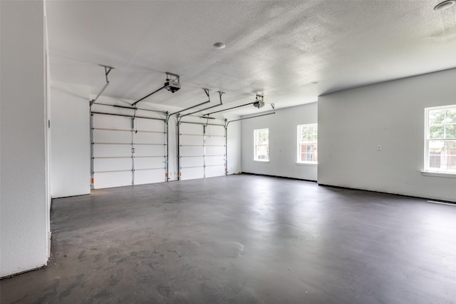 2007 Hill Country Ct, Arlington, TX 76012 - garage featuring a garage door opener
