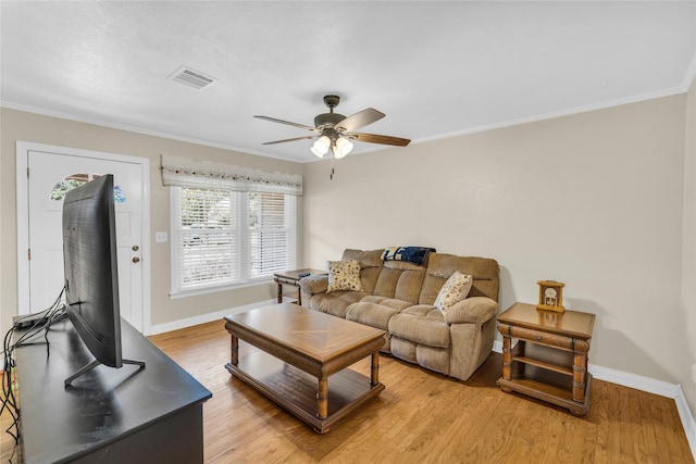 4113 Crestview Dr, Fort Worth, TX 76103 - living room with baseboards, crown molding, a ceiling fan, and light wood-type flooring