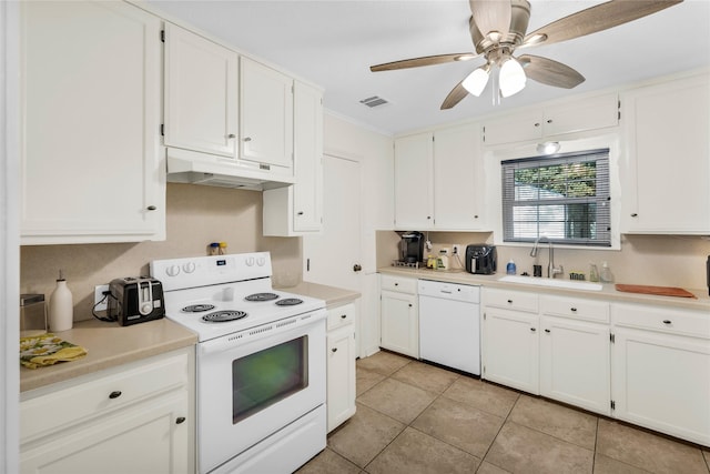 4113 Crestview Dr, Fort Worth, TX 76103 - kitchen with white appliances, under cabinet range hood, a sink, light countertops, and white cabinets