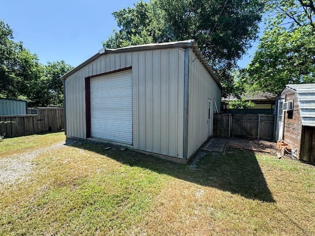 211 W Saunders St, Trenton, TX 75490 - view of outbuilding with a gate