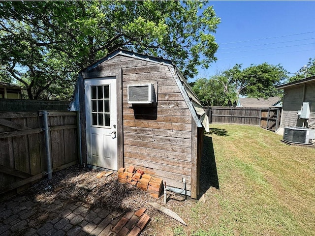 211 W Saunders St, Trenton, TX 75490 - view of shed with central AC and an AC wall unit