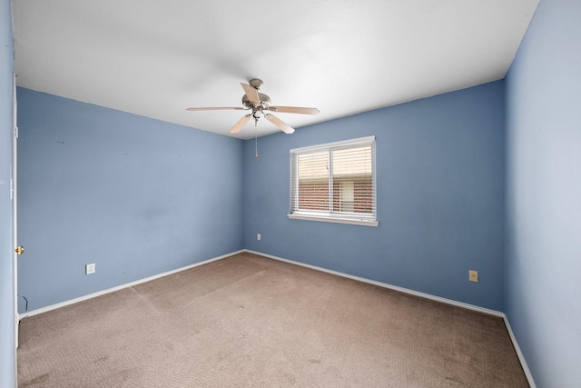 741 Oak Dale Ave, Lake Dallas, TX 75065 - empty room with a ceiling fan, carpet, and baseboards