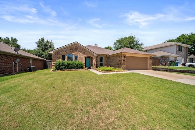 741 Oak Dale Ave, Lake Dallas, TX 75065 - view of front of home featuring an attached garage, concrete driveway, a front yard, and brick siding