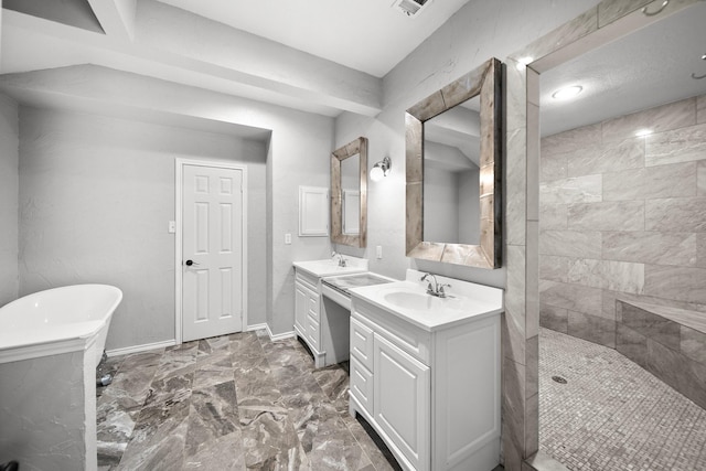 741 Oak Dale Ave, Lake Dallas, TX 75065 - bathroom with two vanities, a soaking tub, and walk in shower