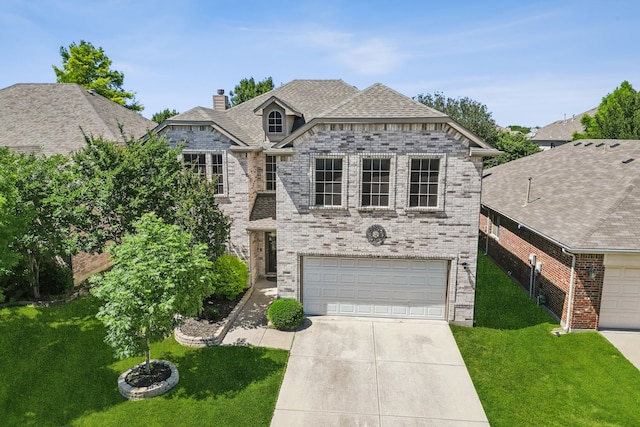 5708 Pebble Ridge Dr, Mckinney, TX 75070 - view of front of home with brick siding, concrete driveway, a front yard, a chimney, and a garage