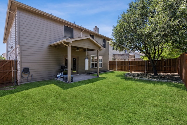 5708 Pebble Ridge Dr, Mckinney, TX 75070 - rear view of property with a chimney, ceiling fan, a patio area, and a gate