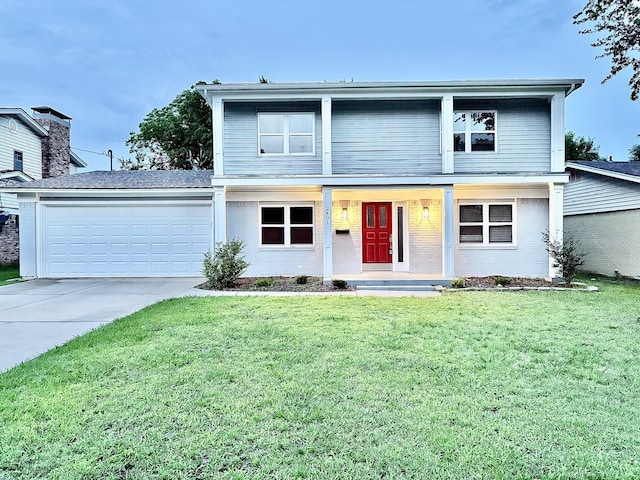 2401 N Alexander St, Sherman, TX 75092 - traditional-style home featuring driveway, a garage, a porch, a front lawn, and brick siding