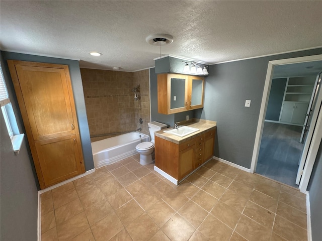 2401 N Alexander St, Sherman, TX 75092 - full bathroom featuring a textured ceiling, vanity, shower / washtub combination, toilet, and tile patterned floors