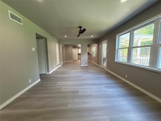 2401 N Alexander St, Sherman, TX 75092 - unfurnished living room with a ceiling fan, recessed lighting, baseboards, and wood finished floors