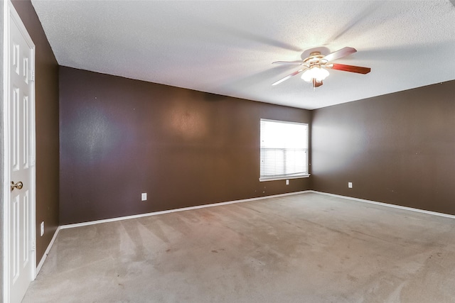 226 Miramar Dr, Arlington, TX 76002 - unfurnished room with a ceiling fan, carpet flooring, baseboards, and a textured ceiling
