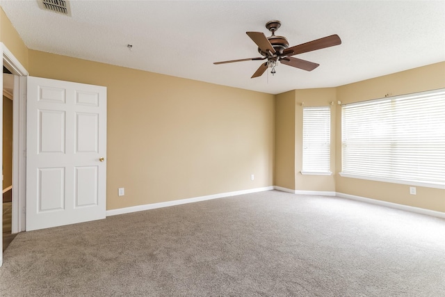 226 Miramar Dr, Arlington, TX 76002 - unfurnished bedroom with carpet, baseboards, and a ceiling fan