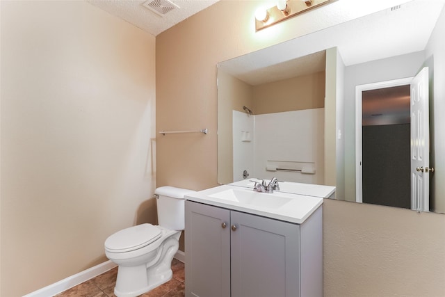226 Miramar Dr, Arlington, TX 76002 - bathroom featuring vanity, toilet, baseboards, tile patterned floors, and a shower