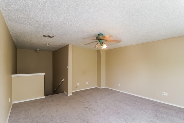 226 Miramar Dr, Arlington, TX 76002 - unfurnished room featuring carpet, ceiling fan, baseboards, and a textured ceiling