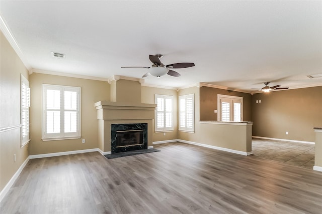 226 Miramar Dr, Arlington, TX 76002 - unfurnished living room featuring ceiling fan, crown molding, a fireplace, and wood finished floors