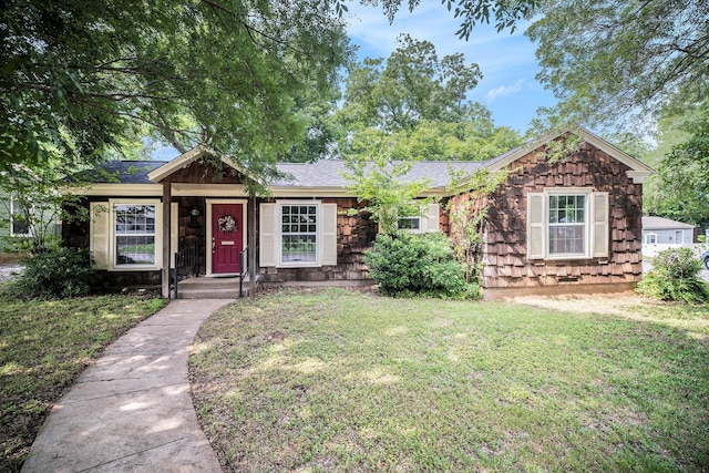 702 W Simmons St, Weatherford, TX 76086 - ranch-style home featuring a front lawn