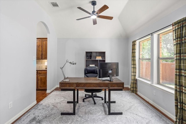 106 Versailles Ln, Aledo, TX 76008 - office with lofted ceiling, a ceiling fan, arched walkways, and baseboards