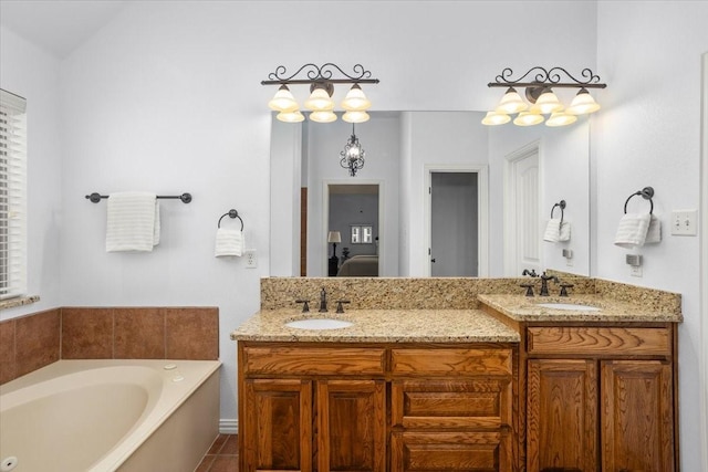 106 Versailles Ln, Aledo, TX 76008 - bathroom featuring double vanity, a garden tub, and tile patterned flooring