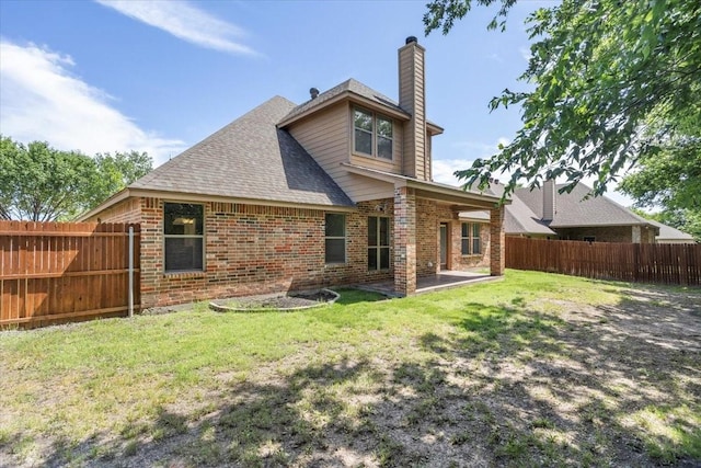 106 Versailles Ln, Aledo, TX 76008 - rear view of property featuring brick siding, a chimney, a patio, and roof with shingles