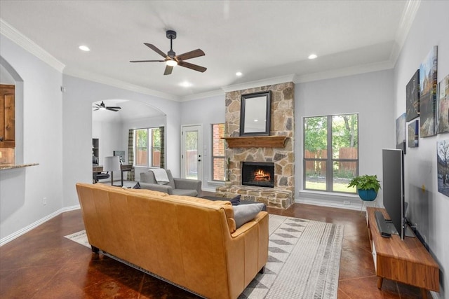 106 Versailles Ln, Aledo, TX 76008 - living room with arched walkways, ceiling fan, a stone fireplace, recessed lighting, and baseboards