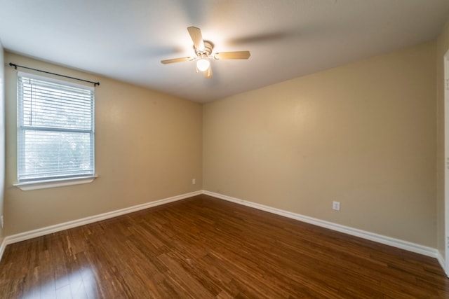 12916 Gillon Dr, Frisco, TX 75035 - unfurnished room with ceiling fan, dark wood finished floors, and baseboards