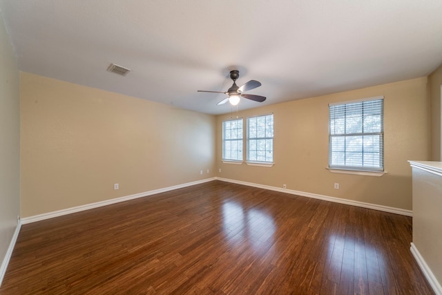 12916 Gillon Dr, Frisco, TX 75035 - spare room featuring ceiling fan, baseboards, and dark wood-style floors