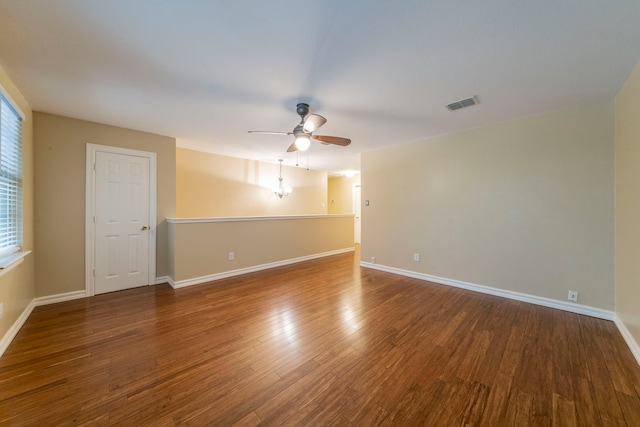 12916 Gillon Dr, Frisco, TX 75035 - spare room featuring ceiling fan, wood finished floors, and baseboards