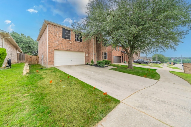 12916 Gillon Dr, Frisco, TX 75035 - view of front of house with driveway, an attached garage, and brick siding