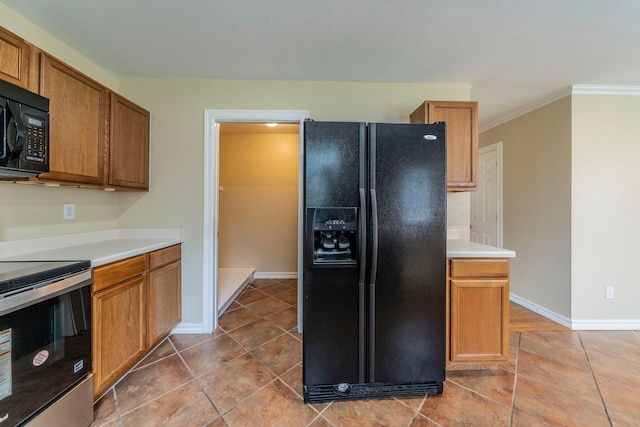 12916 Gillon Dr, Frisco, TX 75035 - kitchen featuring black appliances, baseboards, light tile patterned flooring, light countertops, and ornamental molding