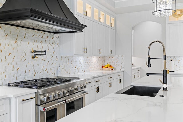 10901 Chriswood Dr, Crowley, TX 76036 - kitchen featuring double oven range, custom range hood, and tasteful backsplash