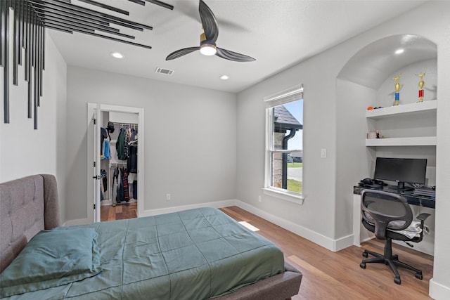 10901 Chriswood Dr, Crowley, TX 76036 - bedroom with wood finished floors, a spacious closet, an office area, a ceiling fan, and recessed lighting
