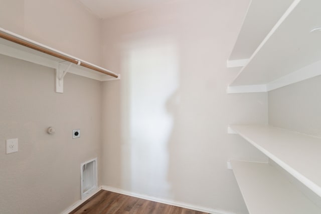 9233 Benevolent Ct, Providence Village, TX 76227 - washroom featuring hookup for an electric dryer and wood finished floors