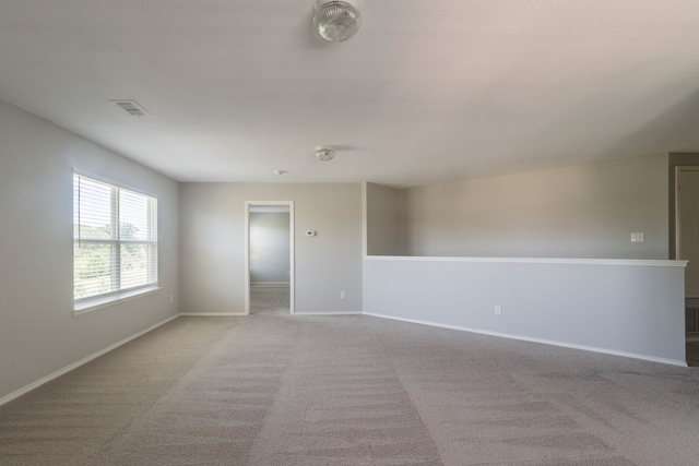 9233 Benevolent Ct, Providence Village, TX 76227 - unfurnished room featuring light carpet and baseboards