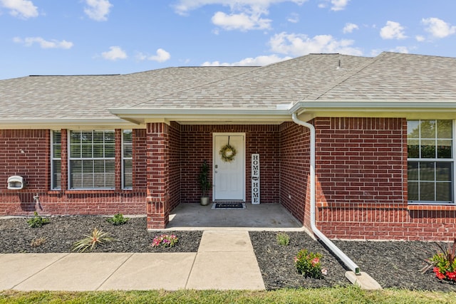 830 Cross Timbers Dr, Lowry Crossing, TX 75069 - property entrance with brick siding and a shingled roof