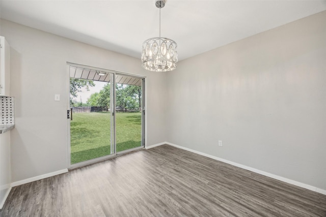 104 W Mistletoe Dr, Kennedale, TX 76060 - unfurnished room with wood finished floors and baseboards
