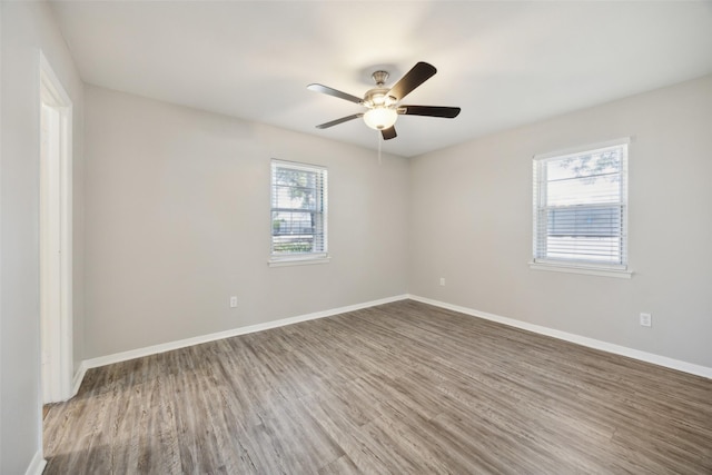 104 W Mistletoe Dr, Kennedale, TX 76060 - unfurnished room featuring wood finished floors, baseboards, and ceiling fan