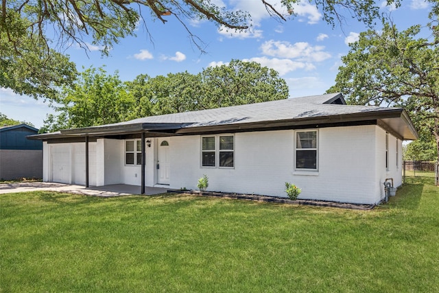 104 W Mistletoe Dr, Kennedale, TX 76060 - view of front facade with an attached garage, brick siding, concrete driveway, and a shingled roof