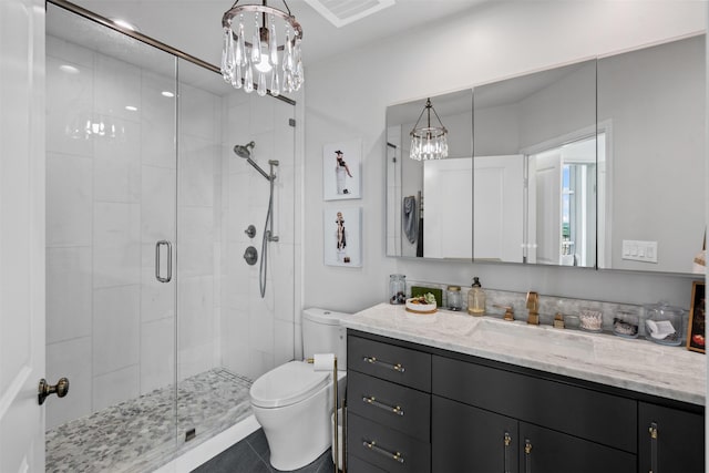 500 Throckmorton St Unit 2707, Fort Worth, TX 76102 - bathroom with a chandelier, vanity, toilet, and a shower stall