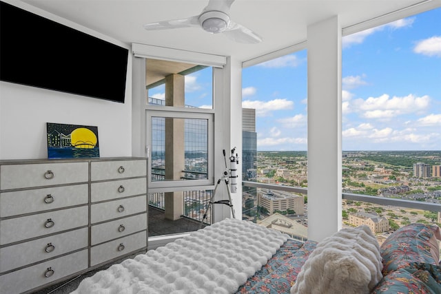 500 Throckmorton St Unit 2707, Fort Worth, TX 76102 - bedroom with a view of city, multiple windows, floor to ceiling windows, and ceiling fan