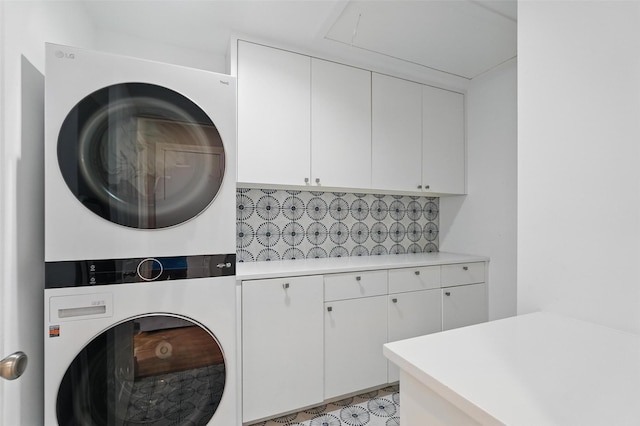 4356 San Carlos St, University Park, TX 75205 - washroom with stacked washing machine and dryer and cabinet space