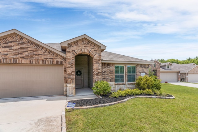 16316 Caledonia Ct, Justin, TX 76247 - view of front of home featuring brick siding, concrete driveway, a front yard, an attached garage, and a shingled roof