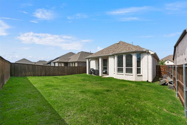 2020 Rhea Ct, Celina, TX 75009 - rear view of house featuring brick siding