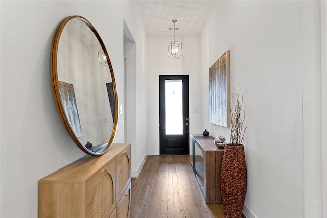 2020 Rhea Ct, Celina, TX 75009 - foyer entrance with hardwood / wood-style flooring, a chandelier, and baseboards