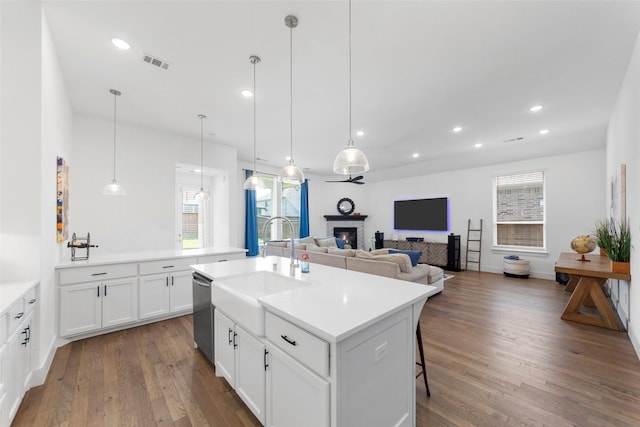 2020 Rhea Ct, Celina, TX 75009 - kitchen featuring a sink, dark wood-style floors, an island with sink, light countertops, and recessed lighting