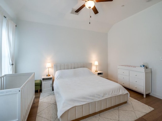 1018 Marian Dr, Allen, TX 75013 - bedroom with light wood-style flooring, lofted ceiling, baseboards, and ceiling fan