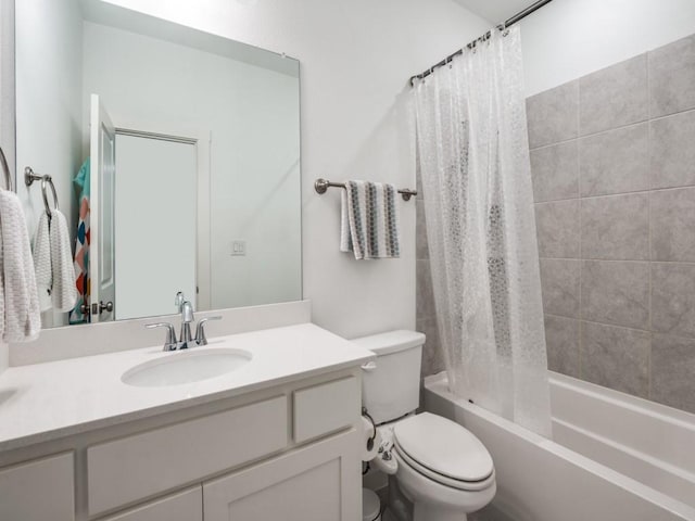 1018 Marian Dr, Allen, TX 75013 - bathroom featuring vanity, toilet, and shower / bath combo with shower curtain